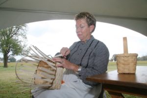 Woman weaving basket